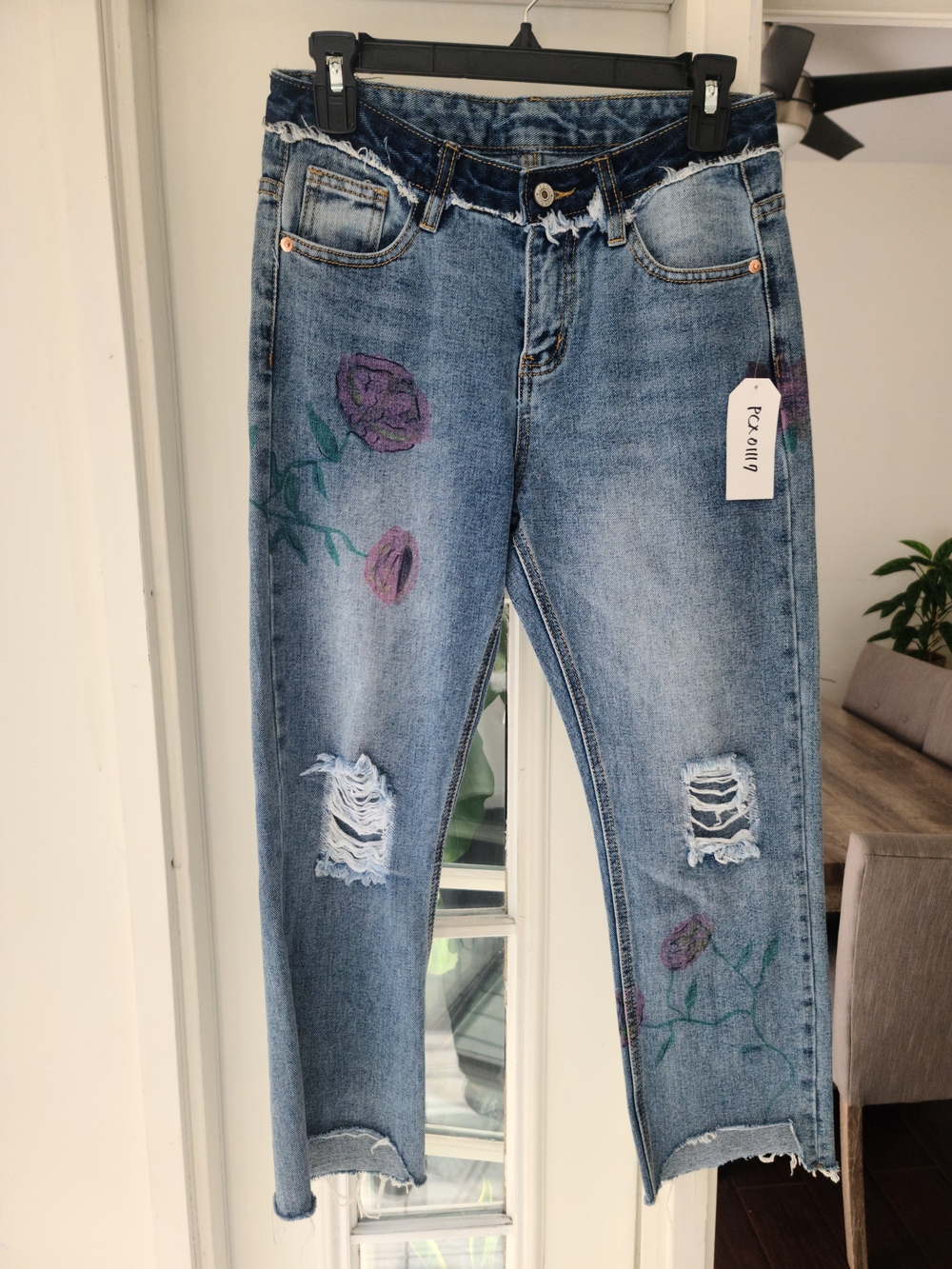 Sadie & Sage Distressed Light Blue Jeans with Purple Floral Embroidery